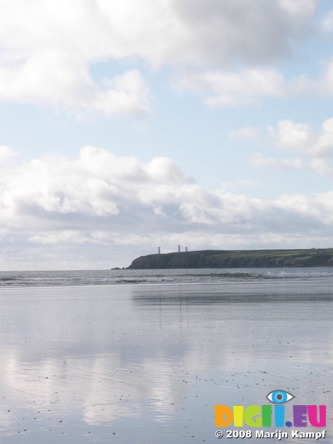 JT00873 Tramore Iron man reflected in beach